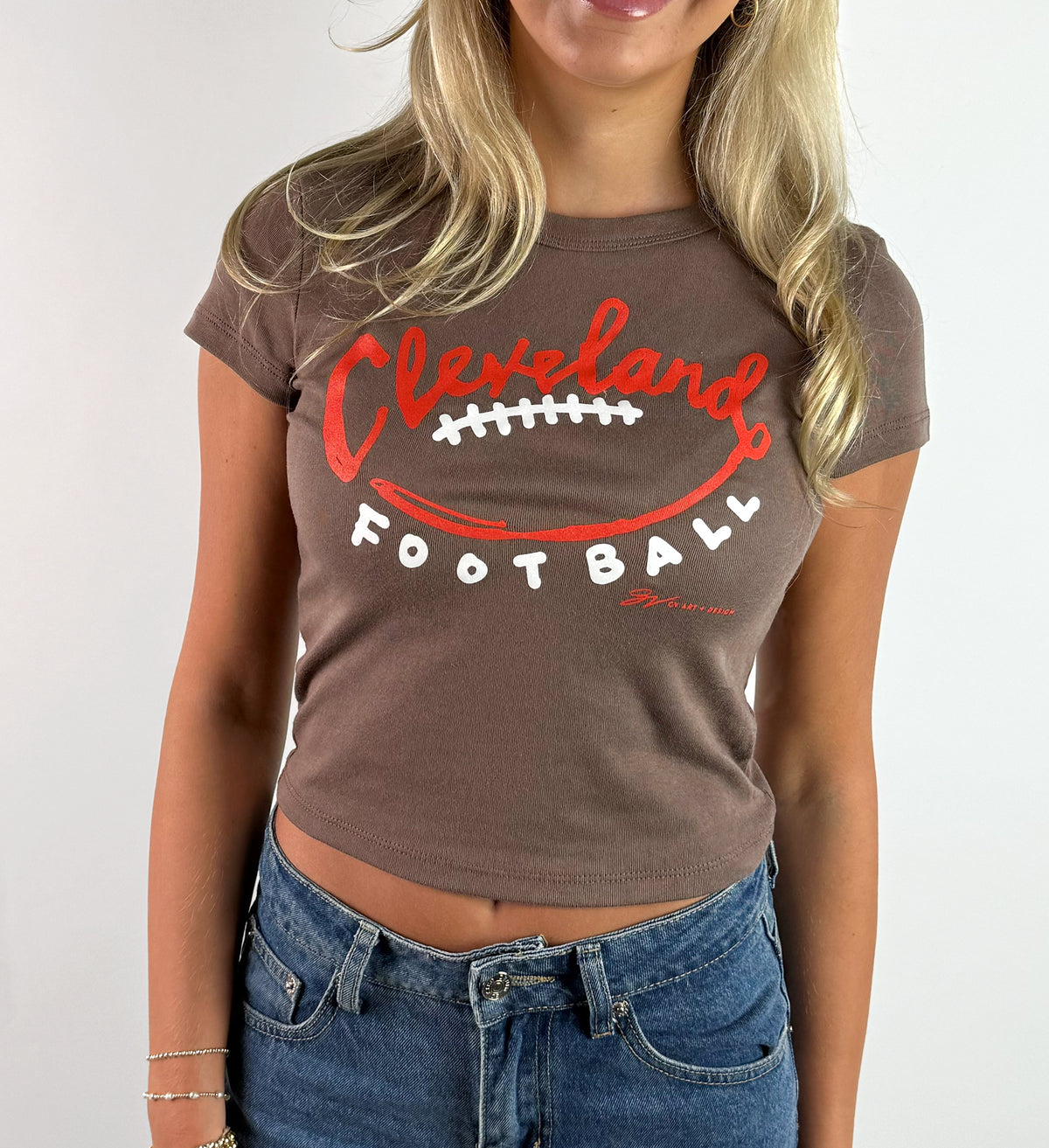 Women's Football Stitches Baby Tee
