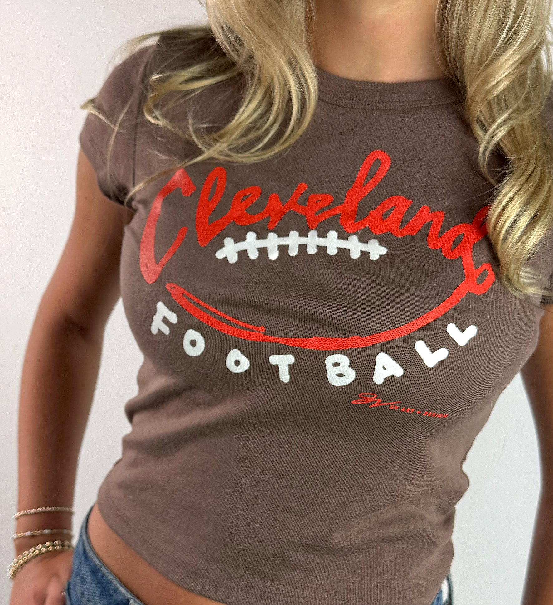 Women's Football Stitches Baby Tee